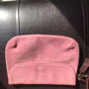 Pink suede clutch